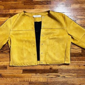 Yellow microsuede bolero styled jacket.